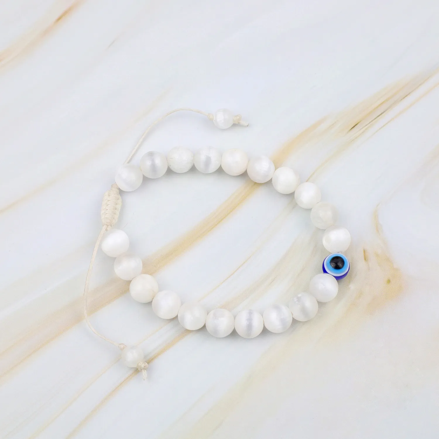 El'Cobre Selenit makramearmbånd evil eye justerbar